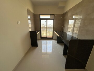 Kitchen in 2 BHK Apartment at Vijay Galaxy, Waghbil – for Rent