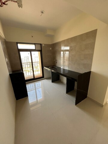 Living Room in 2 BHK Apartment at Vijay Galaxy, Waghbil – for Rent
