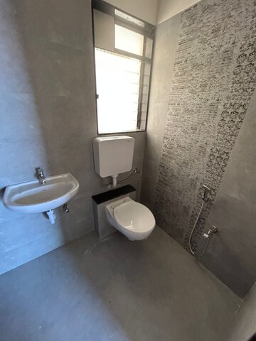 Bathroom in 2 BHK Apartment at Vijay Galaxy, Waghbil – for Rent
