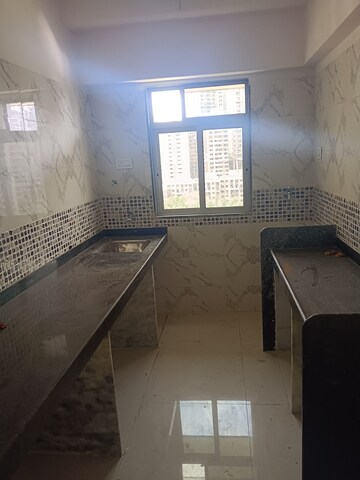 Kitchen in 2 BHK Apartment at Tillibai Apartment, Malad East – for Rent