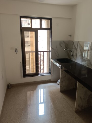 Kitchen in 1.5 BHK Apartment at Rajhans Raj Rani Pride, Malad East – for Rent