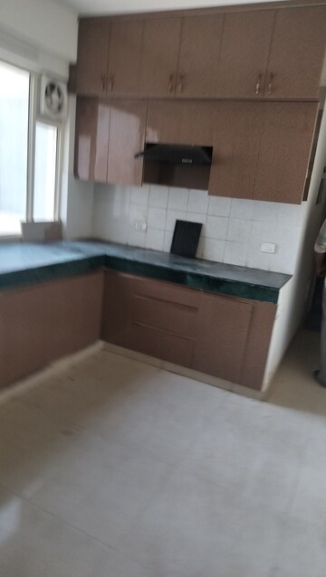Kitchen in 2 BHK Apartment at ROF Aalayas, Sector 102 – for Rent