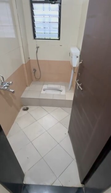 Bathroom in 2 BHK Apartment at Nisarg Akash, Pimple Nilakh – for Rent