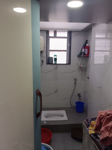 Bathroom in 2 BHK Apartment at Hira Kutir CHS, Malad East – for Rent