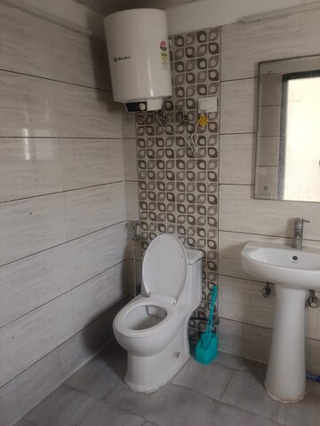 Bathroom in 3 BHK Apartment at Gulshan Bellina, Sector 16 Greater Noida – for Rent
