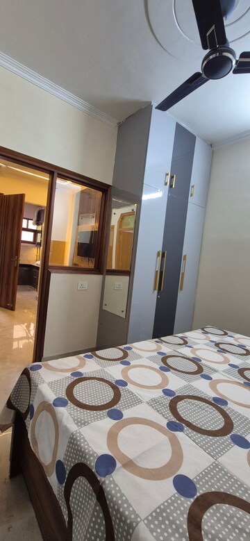 Bedroom in 1.5 BHK Builder Floor at Palm Residency Chhatarpur, Chattarpur – for Rent