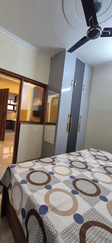 Bedroom in 1.5 BHK Builder Floor at Palm Residency Chhatarpur, Chattarpur – for Rent