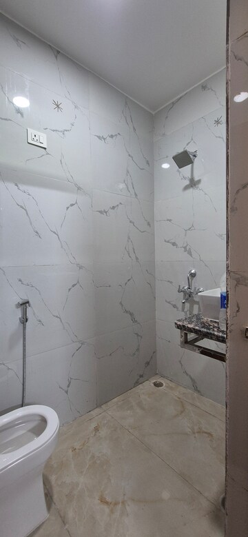 Bathroom in 1.5 BHK Builder Floor at Palm Residency Chhatarpur, Chattarpur – for Rent