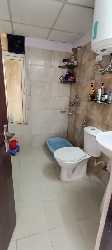 Bathroom in 3 BHK Apartment at Gulshan Bellina, Sector 16 Greater Noida – for Rent