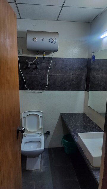 Bathroom in 1 BHK Apartment at Paramount Golfforeste, Zeta I Greater Noida – for Rent