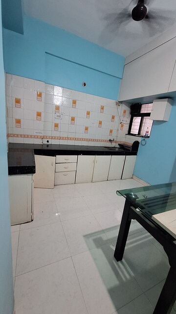 Kitchen in 1 BHK Apartment at Yash Shubham Heights, Warje – for Rent