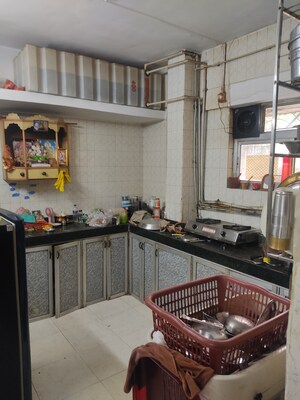 Kitchen in 2 BHK Apartment at Mira Sadan CHS, Mira Road – for Sale