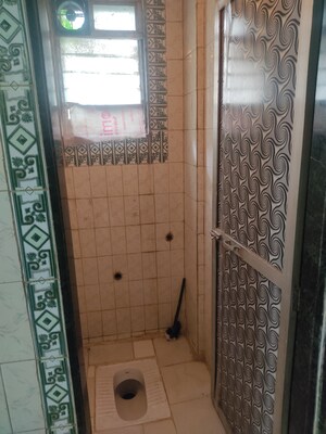 Bathroom in 2 BHK Apartment at Mira Sadan CHS, Mira Road – for Sale