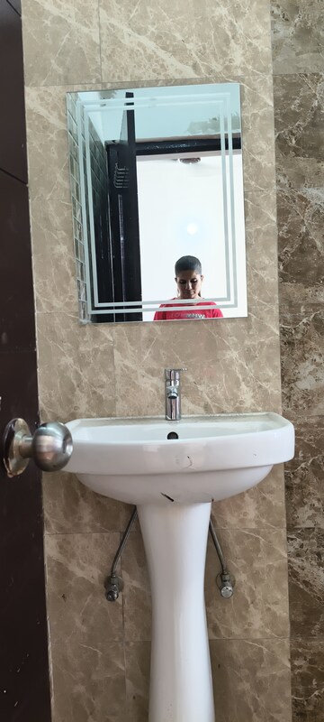 Bathroom in 2.5 BHK Apartment at Prateek Grand Paeonia, Krishna Vihar – for Rent