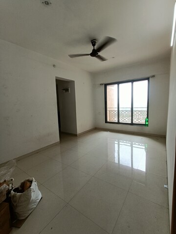 Living Room in 1 BHK Apartment at Lodha Panacea Phase 2, Dombivli East – for Rent