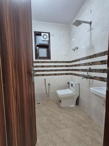Bathroom in 1.5 BHK Builder Floor at Palm Residency Chhatarpur, Chattarpur – for Rent