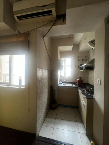 Kitchen in 1 BHK Apartment at Paras Tierea, Sector 137 – for Rent