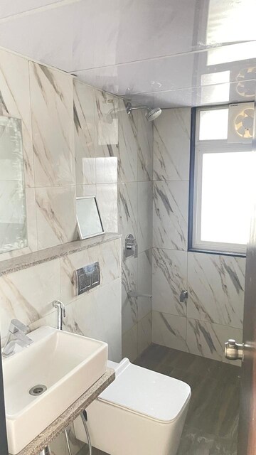 Bathroom in 2 BHK Apartment at Rama Melange Residences, Hinjewadi – for Rent
