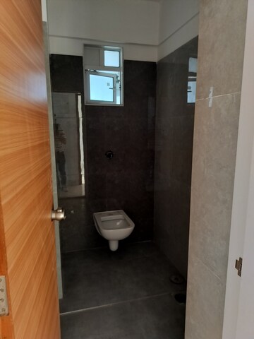 Bathroom in 2 BHK Apartment at Town Aastha Heights, Goregaon West – for Rent