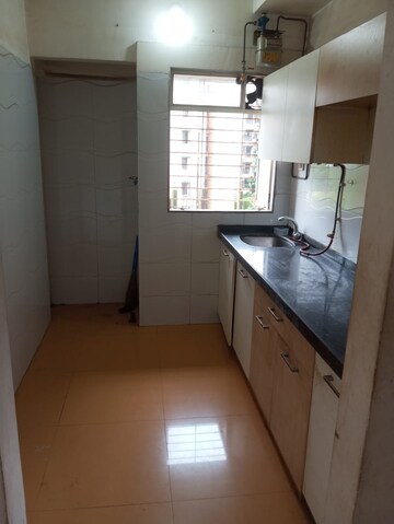 Kitchen in 1 BHK Apartment at Rutu Enclave, Kasarvadavali – for Rent