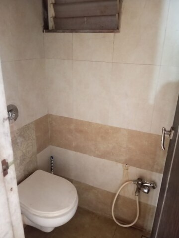 Bathroom in 1 BHK Apartment at Rutu Enclave, Kasarvadavali – for Rent