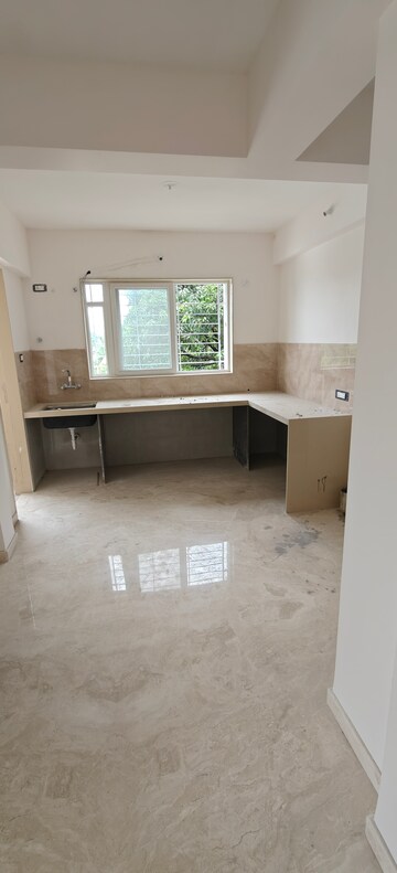 Kitchen in 3 BHK Apartment at Angal Nilay, Model Colony – for Rent