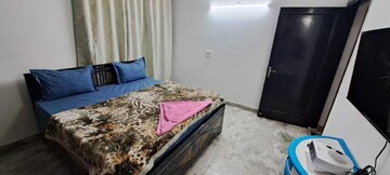 Bedroom in 3 BHK Builder Floor at Nehru Enclave – for Rent