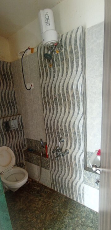 Bathroom in 1 BHK Apartment at Man Opus, Mira Road – for Rent