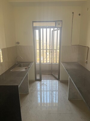 Kitchen in 2 BHK Apartment at Kalpataru Paramount, Kapur Bawdi – for Sale