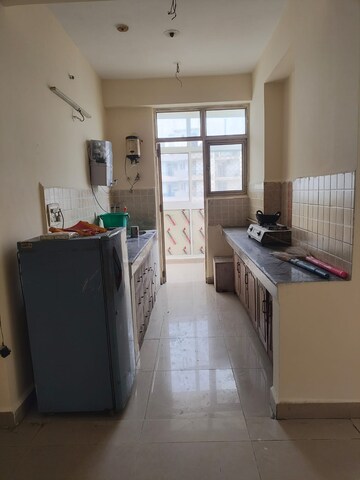 Kitchen in 3 BHK Apartment at Ajnara Gen X, Dundahera – for Rent