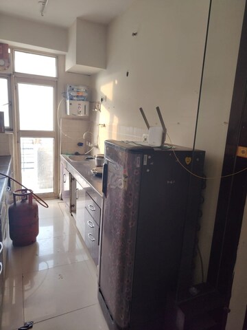 Kitchen in 2 BHK Apartment at Ajnara Gen X, Dundahera – for Rent