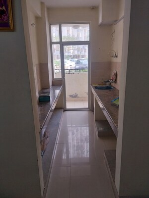 Kitchen in 2 BHK Apartment at Mahagun Mahagunpuram II, Lal Kuan – for Sale