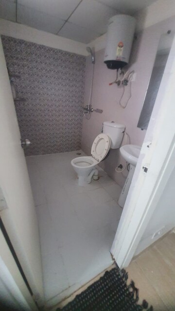 Bathroom in 1 BHK Apartment at Gaur City 2 – for Rent