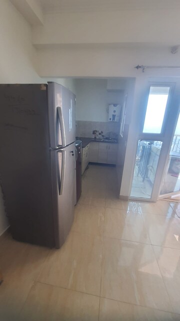 Living Room in 1 BHK Apartment at Gaur City 2 – for Rent