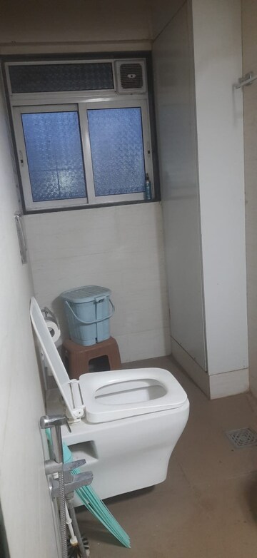 Bathroom in 2 BHK Apartment at Shree Tirupati STG Signature Residency, Patlipada – for Rent