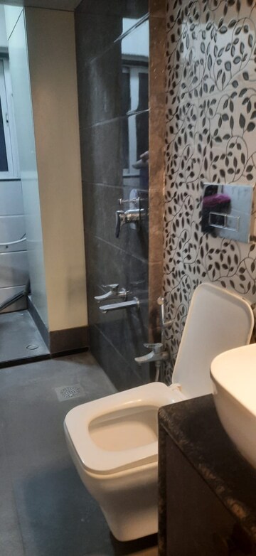 Bathroom in 2 BHK Apartment at Shree Tirupati STG Signature Residency, Patlipada – for Rent