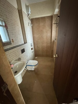 Bathroom in 2 BHK Apartment at Shiv Guru Ashish, Mulund East – for Sale