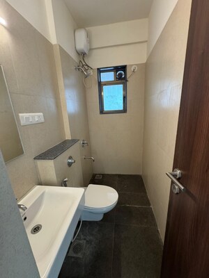 Bathroom in 2 BHK Apartment at Shiv Guru Ashish, Mulund East – for Sale
