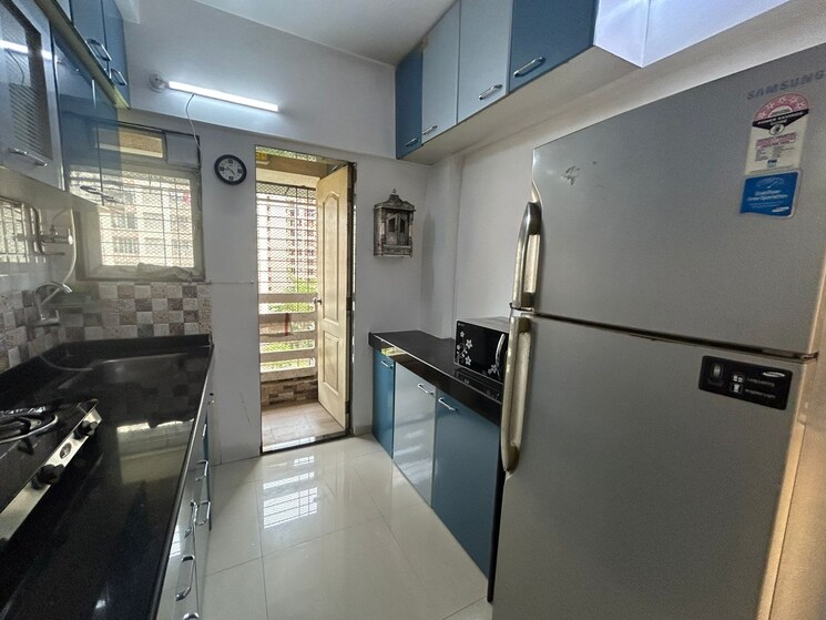 Kitchen, cosmos-orchid 1 Bedroom 450 Sq.Ft. Apartment In Ghodbunder Road Thane 8837507