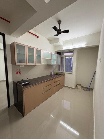 Kitchen in 1 BHK Apartment at Cosmos Orchid, Ghodbunder Road – for Rent
