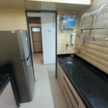 Kitchen in 3 BHK Apartment at Satyam CHS Andheri West, Jeevan Nagar – for Rent