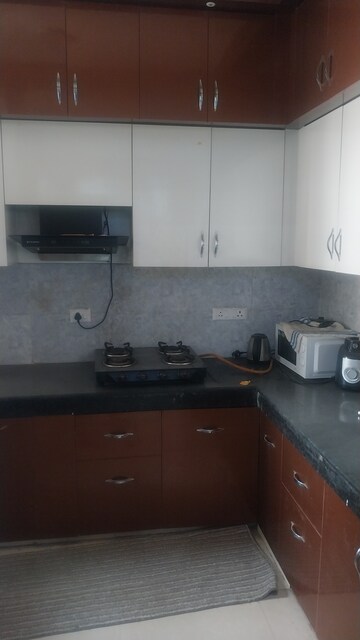 Kitchen in 3 BHK Apartment at Sanchar Nest Palm Valley, Wave City – for Sale