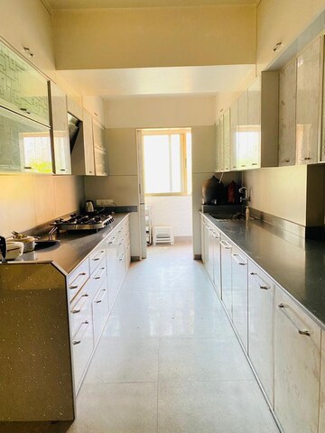 Kitchen in 4 BHK Apartment at Hiranandani Gardens Odyssey I II, Powai – for Sale