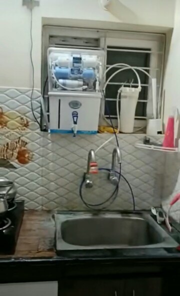 Bathroom in 2 BHK Apartment at Asha Nagar CHS, Mulund West – for Rent