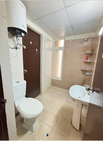 Bathroom in 2 BHK Apartment at Habitech Panch Tatva, Tech Zone 4 Greater Noida – for Rent
