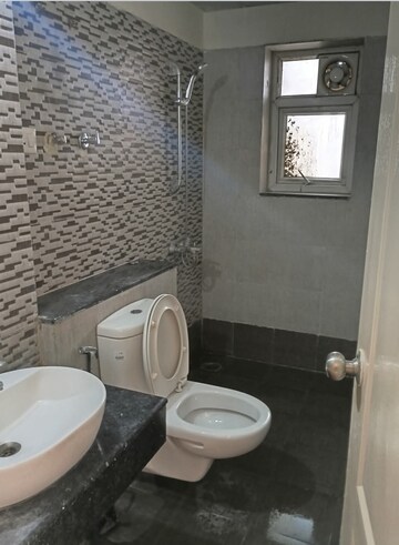 Bathroom in 3 BHK Apartment at Shri Radha Sky Gardens, Sector 16b Greater Noida – for Rent