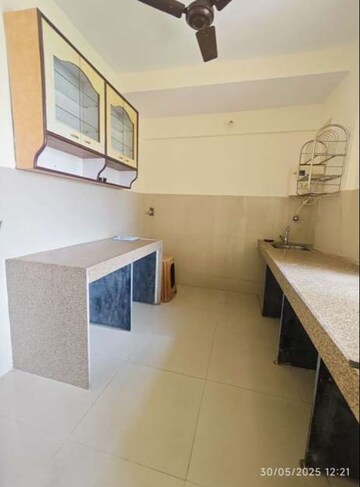 Kitchen in 2 BHK Apartment at Puranik Capitol, Ghodbunder Road – for Sale