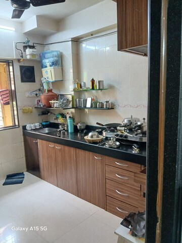 Kitchen in 1 BHK Apartment at Shah Arcade II, Malad East – for Sale