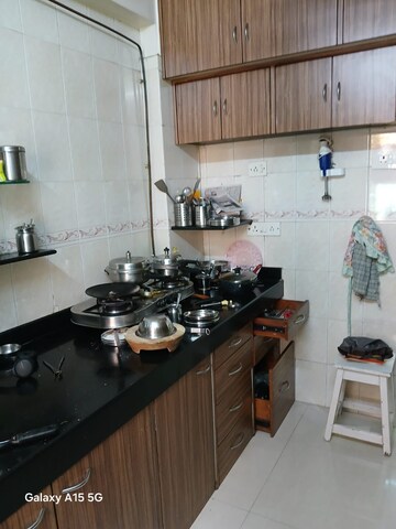 Kitchen in 1 BHK Apartment at Shah Arcade II, Malad East – for Sale