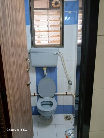 Bathroom in 1 BHK Apartment at Shah Arcade II, Malad East – for Sale